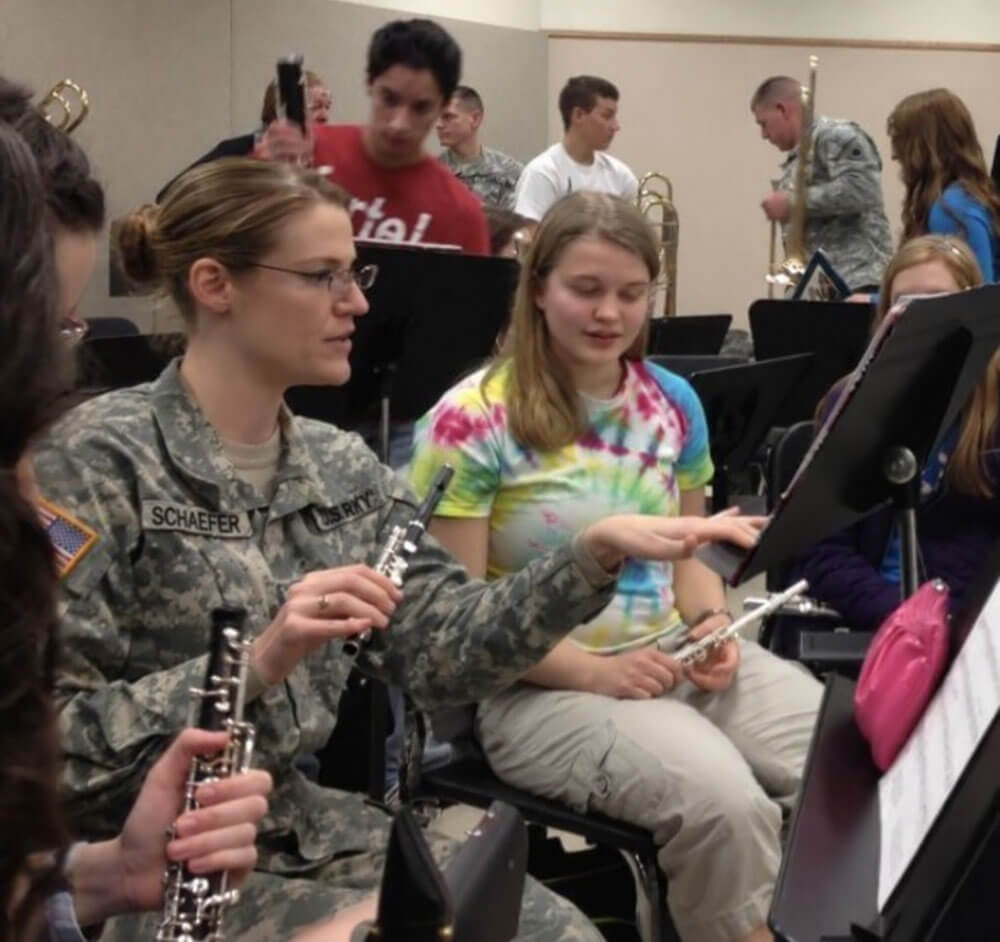 Heather teaching Piccolo to young students